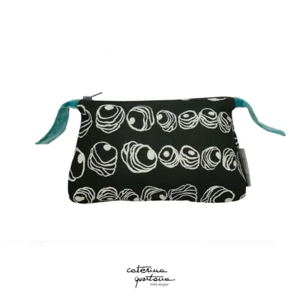 Pochette in tessuto jacquard colore nero bianco e velluto verde smeraldo