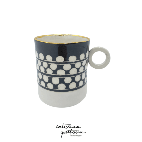Tazza da tè nera e bianca con disegno Bouclè, bordata in oro zecchino